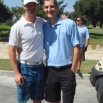 The winner of the putting contest Brett Becker (left) with one of his friends.